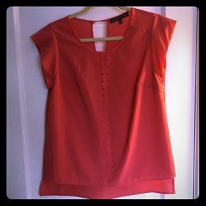 Coral blouse with cute outs down the front